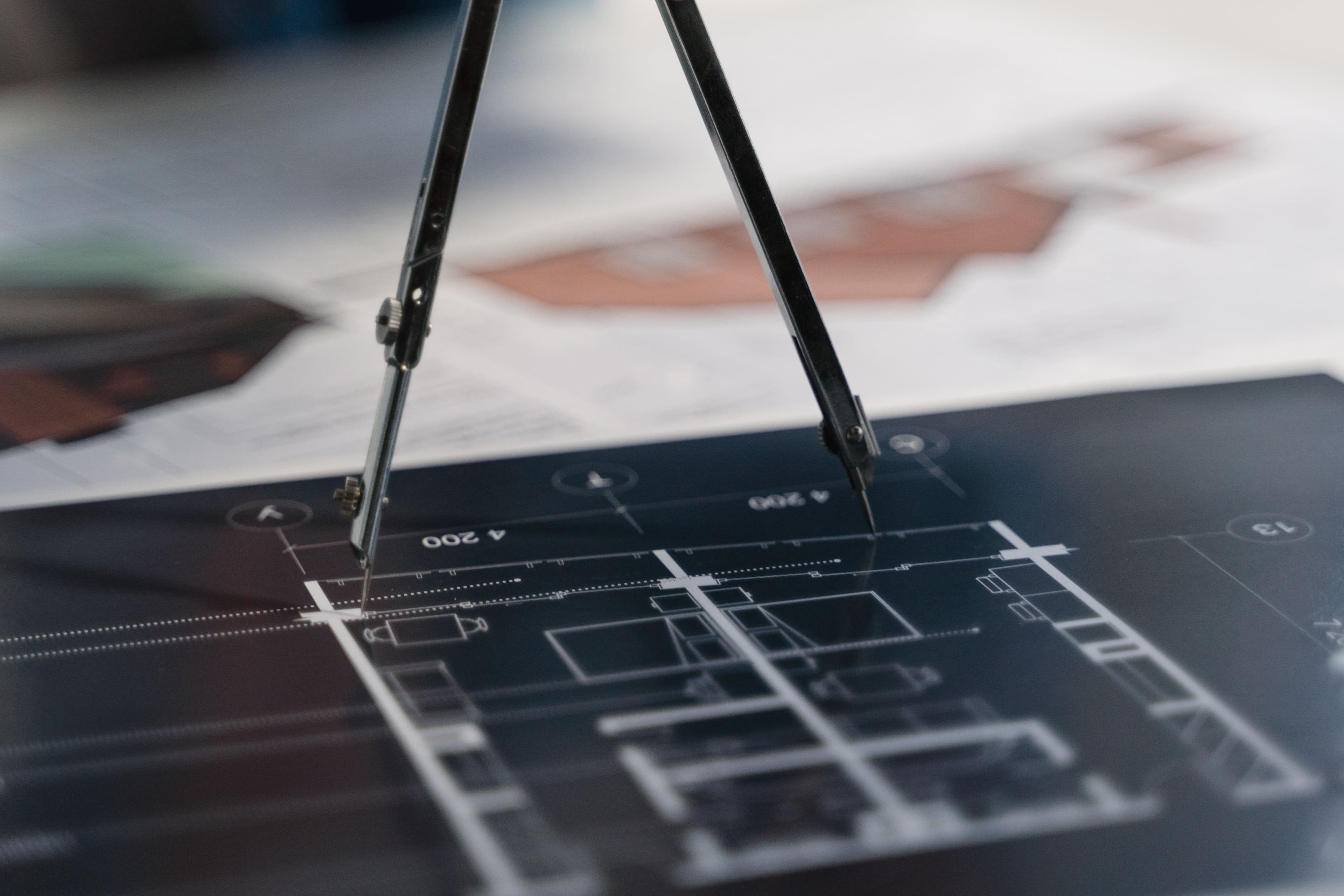 Close up photo of a diagram with drawing compass